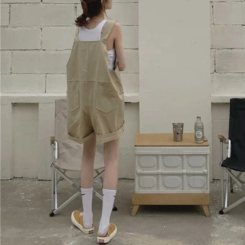 Women Rompers Summer Sleeveless Safari Style Playsuits Wide-leg Multi-pockets Leisure Harajuku High Waist Baggy Overalls Female
Women Rompers Summer Sleeveless Safari Style Playsuits Wide-leg Multi-pockets Leisure Harajuku High Waist Baggy Overalls Female