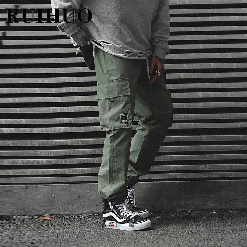 RUIHUO 2021 New Casual Cargo Pants Men Trousers Joggers Pants Men Sweatpants Hip Hop Streetwear Male Plus Size M-2XL
RUIHUO 2021 New Casual Cargo Pants Men Trousers Joggers Pants Men Sweatpants Hip Hop Streetwear Male Plus Size M-2XL