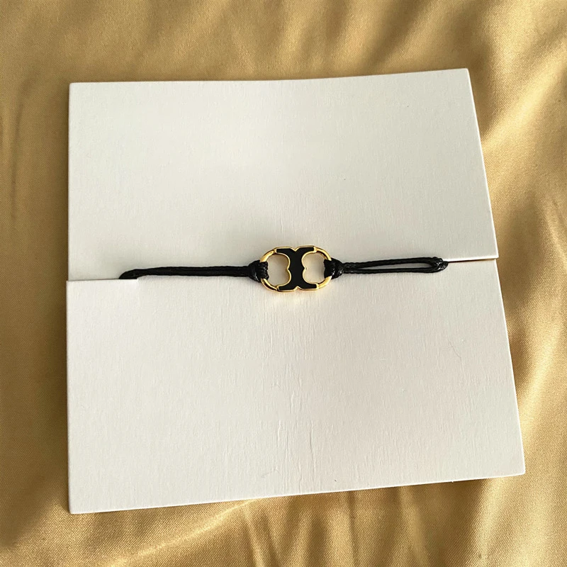 Hot Selling European American Jewelry Luxury Brand TB Red String Bracelet Enamel Double T Metal Label Adjustable Wristband Gift
Hot Selling European American Jewelry Luxury Brand TB Red String Bracelet Enamel Double T Metal Label Adjustable Wristband Gift