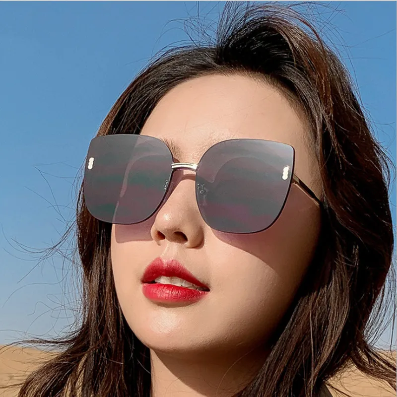 2021 New Fashion Rimless Trimmed Sunglasses Female One-piece Fashion Glasses Sun Big Frame Metal Cat Eye Sunglasses Female UV400
2021 New Fashion Rimless Trimmed Sunglasses Female One-piece Fashion Glasses Sun Big Frame Metal Cat Eye Sunglasses Female UV400