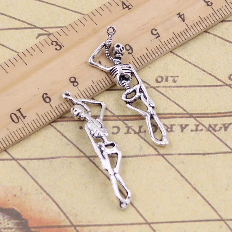 15pcs Charms skeleton man halloween 42x8mm Tibetan Silver Color Pendants Antique Jewelry Making DIY Handmade Craft for Necklace 
15pcs Charms skeleton man halloween 42x8mm Tibetan Silver Color Pendants Antique Jewelry Making DIY Handmade Craft for Necklace