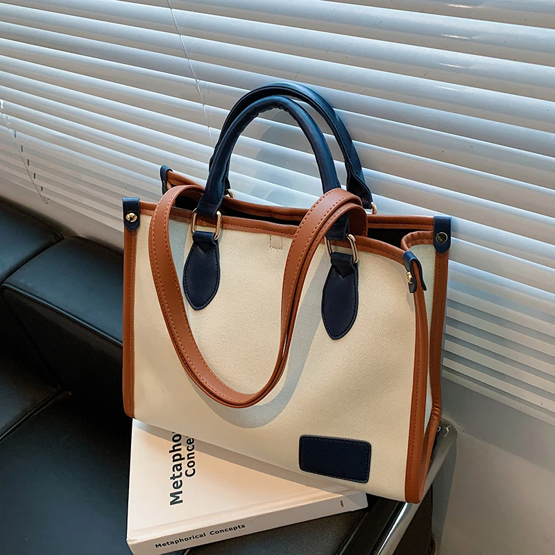 Niche Design Large-capacity Bag 2021 New Female Bag Autumn Canvas Bag Commuter Shoulder Bag Handbag Tote Bag Width: 29cm 
Niche Design Large-capacity Bag 2021 New Female Bag Autumn Canvas Bag Commuter Shoulder Bag Handbag Tote Bag Width: 29cm