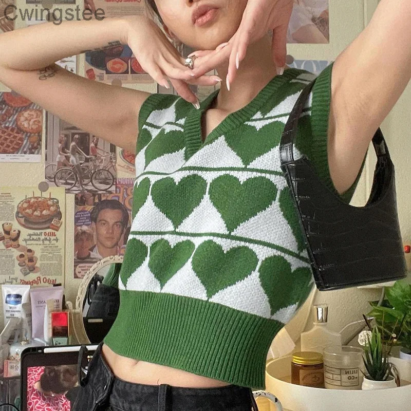 Женский трикотажный пуловер без рукавов, с принтом в виде сердца
Женский трикотажный пуловер без рукавов, с принтом в виде сердца