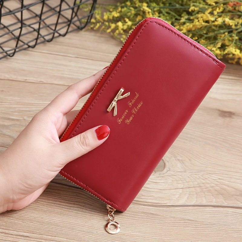 Women Wallets Cute Bowknot Long Solid Color Female Letter Zipper Pu Leather Coin Purses Ladies Card Holder Clutch Bag Phone Bag
Women Wallets Cute Bowknot Long Solid Color Female Letter Zipper Pu Leather Coin Purses Ladies Card Holder Clutch Bag Phone Bag
