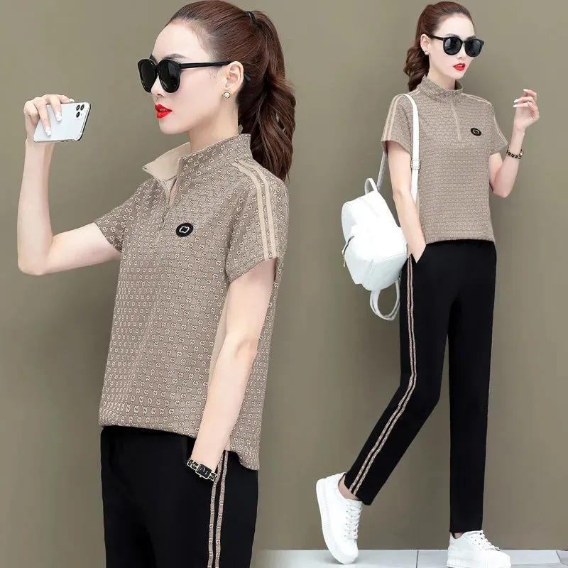Korean Spliced Tracksuit Two Piece Set Women Casual Fake Zippers Summer Short Sleeves Top Fashion Slim Pant Plus Size Outfits
Korean Spliced Tracksuit Two Piece Set Women Casual Fake Zippers Summer Short Sleeves Top Fashion Slim Pant Plus Size Outfits