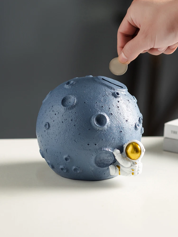Nordic astronaut's deposit box, astronaut's ornament can be saved, children's creative household coin deposit box
Nordic astronaut's deposit box, astronaut's ornament can be saved, children's creative household coin deposit box