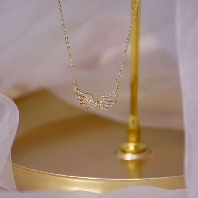 Korean angel wing copper micro inlaid jewelry plated with 14K real gold wing shape design temperament women's short clavicle Cha
Korean angel wing copper micro inlaid jewelry plated with 14K real gold wing shape design temperament women's short clavicle Cha
