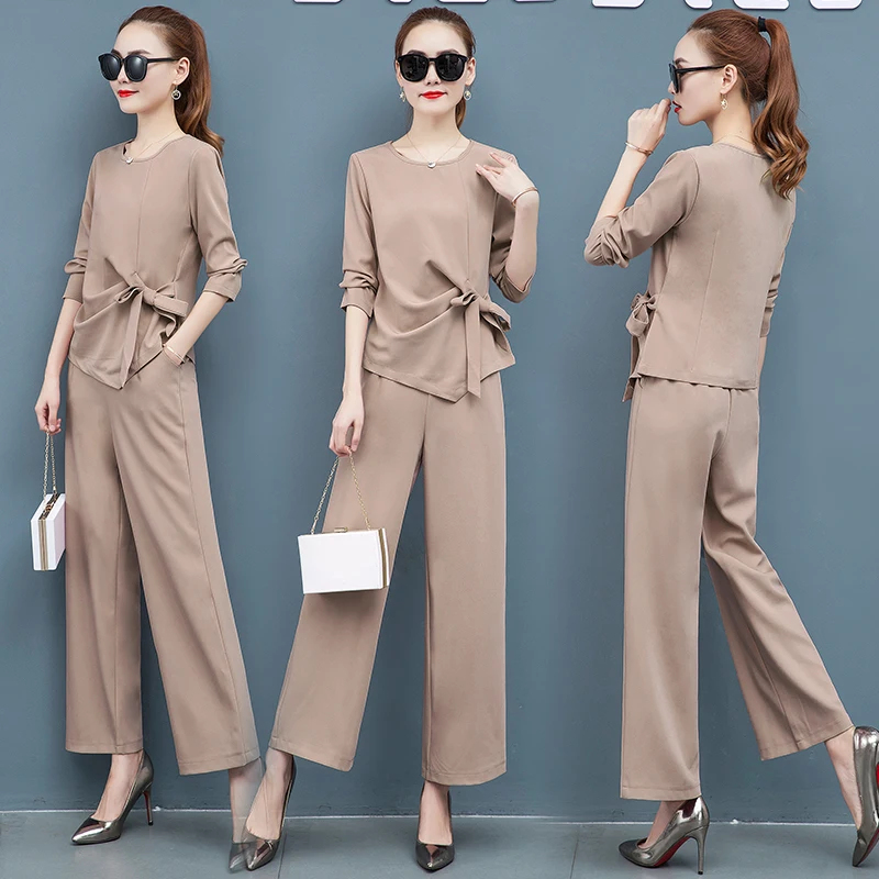 Autumn Fashion Leisure Suit New Bow O Neck Shirt Sweatshirt & Wide-Legged Pants Two-Piece Outfit Office Lady Style Leisure Sets
Autumn Fashion Leisure Suit New Bow O Neck Shirt Sweatshirt & Wide-Legged Pants Two-Piece Outfit Office Lady Style Leisure Sets