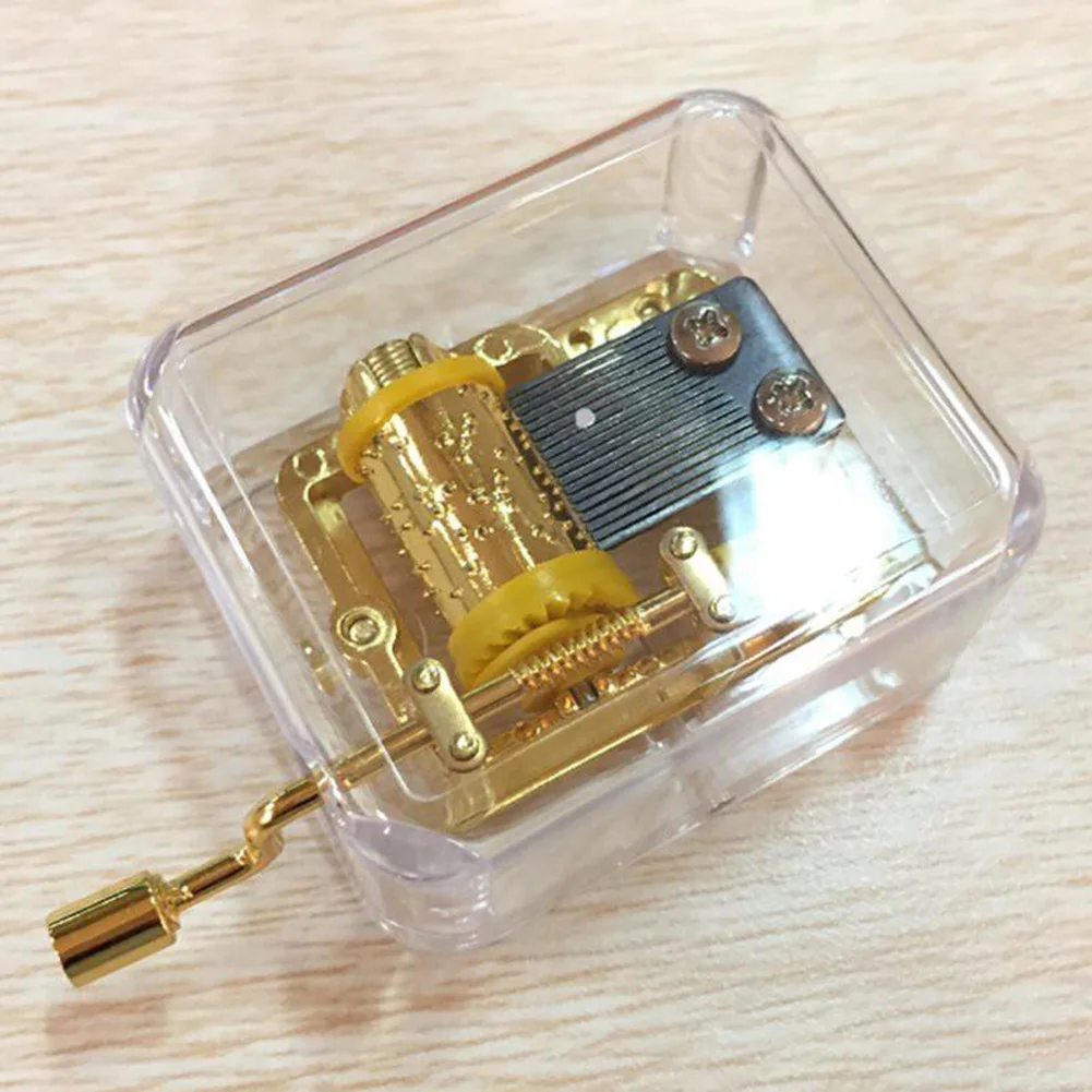 Portable Transparent Hand Crank Mechanical Music Box Musical Toy Party Gift Education Toy New
Portable Transparent Hand Crank Mechanical Music Box Musical Toy Party Gift Education Toy New