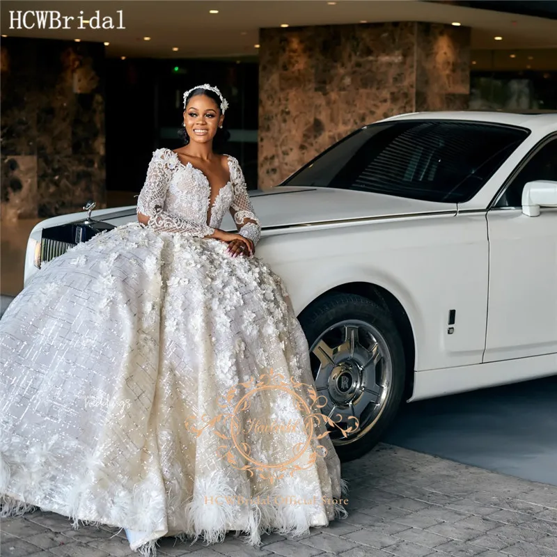 Luxury South African Ball Gown Wedding Dress Long Sleeves Feather Shiny Flowers Backless Sexy Bride Wedding Party Gowns
Luxury South African Ball Gown Wedding Dress Long Sleeves Feather Shiny Flowers Backless Sexy Bride Wedding Party Gowns