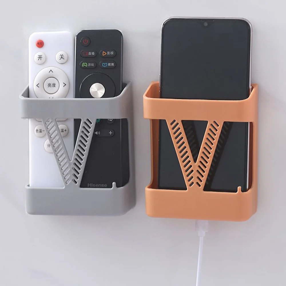 Self-adhesive Wall Mounted Phone Holder Remote Control Storage Box Wall Shelf Stand Phone Charging Bracket Home Hotel Universal
Self-adhesive Wall Mounted Phone Holder Remote Control Storage Box Wall Shelf Stand Phone Charging Bracket Home Hotel Universal
