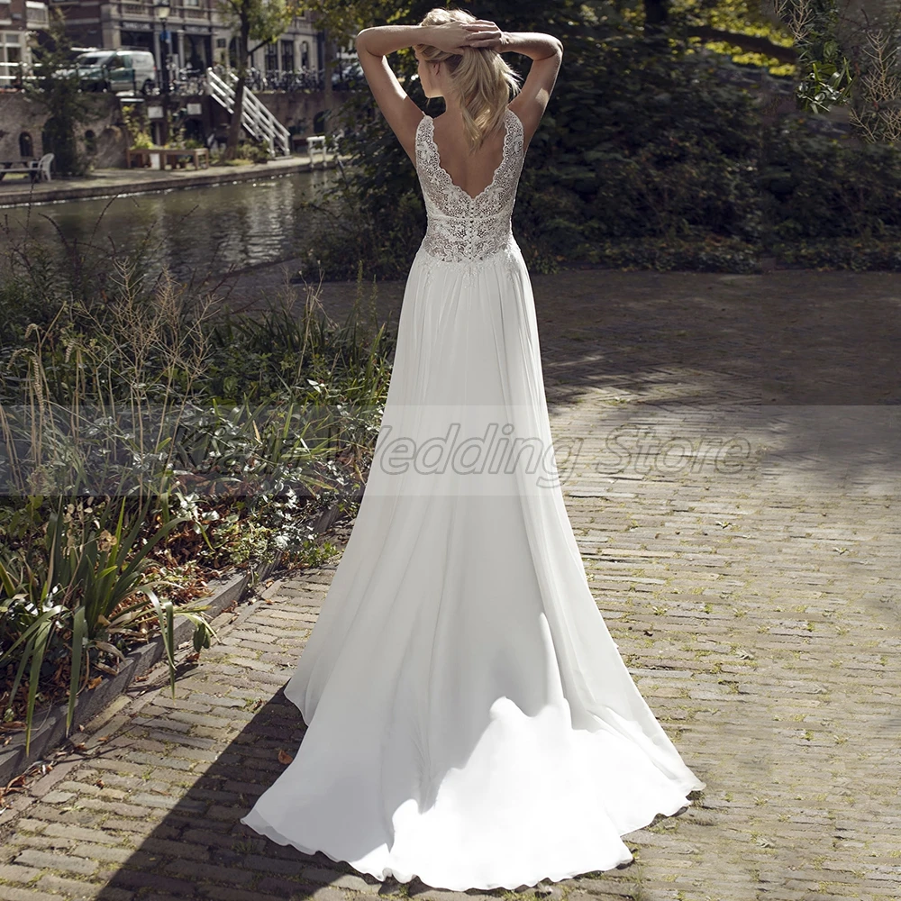 Charming A-Line Sleevelss Sweep Train Bridal Gowns with Lace V-Neck Button Back Chiffon Wedding Dress Robe De Mariée 
Charming A-Line Sleevelss Sweep Train Bridal Gowns with Lace V-Neck Button Back Chiffon Wedding Dress Robe De Mariée