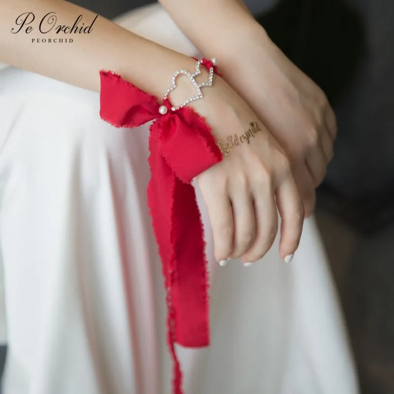 PEORCHID Silk Ribbon Red Team Bride Bracelet With Beads Pearls Bridesmaid Wrist flower Bracelet Wedding Accsesories Party Gift
PEORCHID Silk Ribbon Red Team Bride Bracelet With Beads Pearls Bridesmaid Wrist flower Bracelet Wedding Accsesories Party Gift