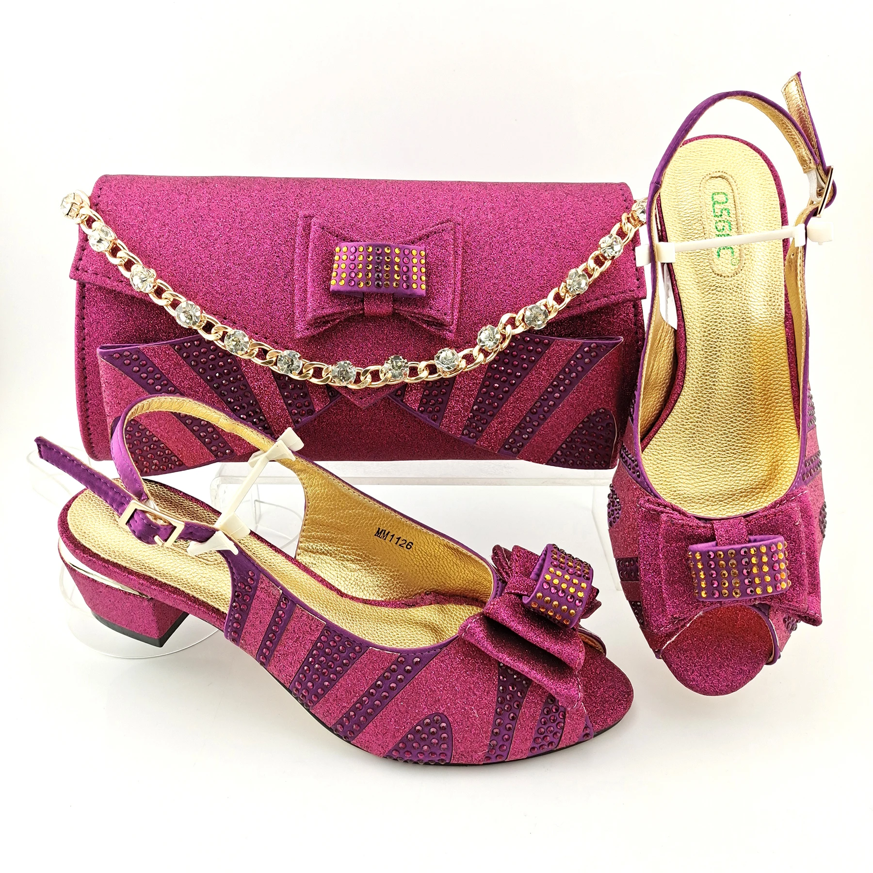 African Latest Fashion Italian Design Noble Ladies Shoes and Bag Set in Magenta Color for Party
African Latest Fashion Italian Design Noble Ladies Shoes and Bag Set in Magenta Color for Party