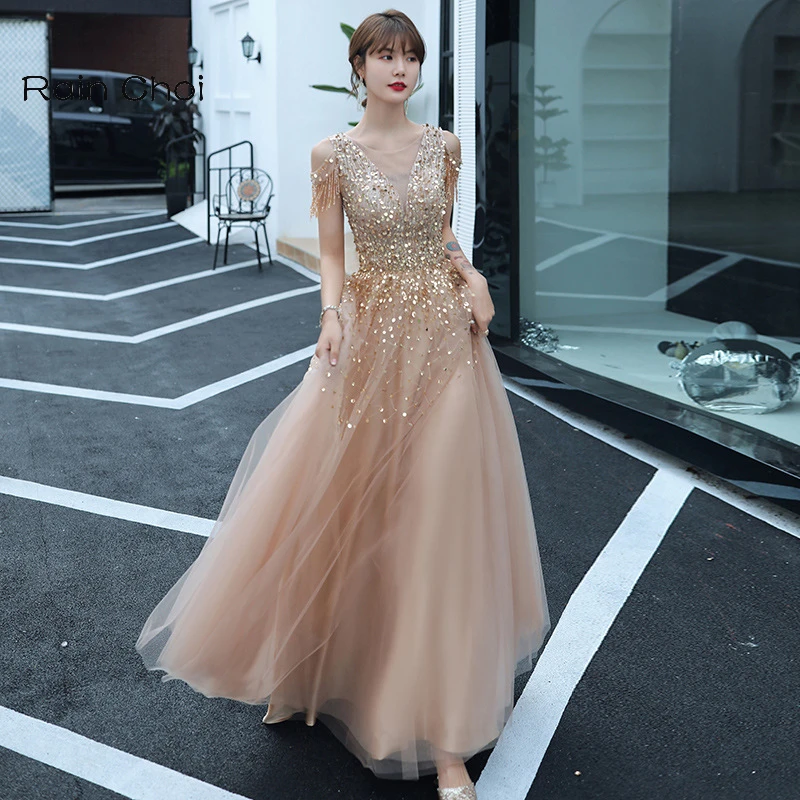 Beading Prom Dresses Long Silver Gray Tulle Sleeveless Formal Evening Gown A-Line Backless Silver Gray Vestidos De Noche 
Beading Prom Dresses Long Silver Gray Tulle Sleeveless Formal Evening Gown A-Line Backless Silver Gray Vestidos De Noche