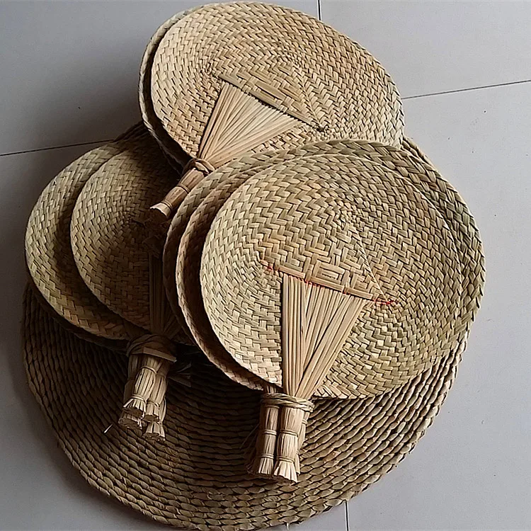 High quality Pu fan grass weaving craft fan pure manual grass fan classic ordinary props fan hand fan hand made fabric fans
High quality Pu fan grass weaving craft fan pure manual grass fan classic ordinary props fan hand fan hand made fabric fans