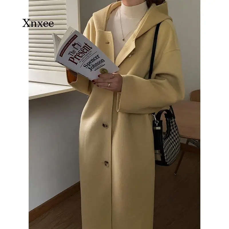 Vintage Hooded Woolen Coat One-Breasted Long Sleeve Winter New Solid Color Loose Mid-Length Woolen Overcoat Windbreaker Outwear
Vintage Hooded Woolen Coat One-Breasted Long Sleeve Winter New Solid Color Loose Mid-Length Woolen Overcoat Windbreaker Outwear