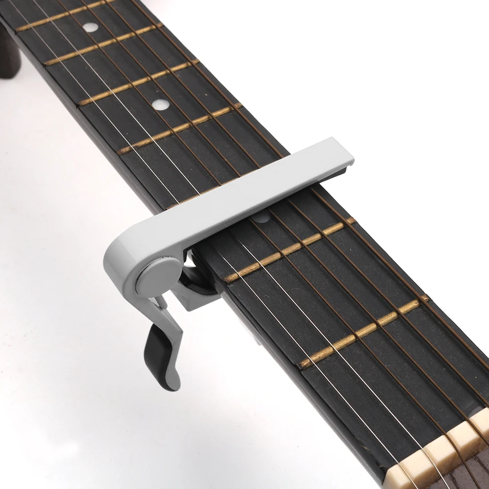 Aluminium Alloy Capo Guitar Parts Quick Change Clamp Universal Tone Adjusting for Music Lovers Playing Accessories 
Aluminium Alloy Capo Guitar Parts Quick Change Clamp Universal Tone Adjusting for Music Lovers Playing Accessories