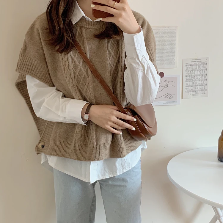 Women Knitted Shawl Cloak Vest Korean Wild Round Neck Sweater Female New Fashion Linen Pattern Loose Casual Solid Sweaters Vest
Women Knitted Shawl Cloak Vest Korean Wild Round Neck Sweater Female New Fashion Linen Pattern Loose Casual Solid Sweaters Vest