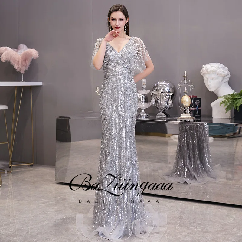 BAZIIINGAAA Luxury Beaded Silver Evening Dress Sleeveless V-neck Tassel Design Formal Dresses Evening Gown Royal Silver Dress
BAZIIINGAAA Luxury Beaded Silver Evening Dress Sleeveless V-neck Tassel Design Formal Dresses Evening Gown Royal Silver Dress