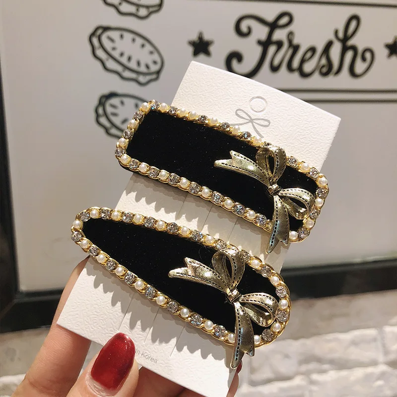 Women Pearl Hairpin Korea Fashion Velvet Metal Bow Rhinestone Clip Headdress Side Clip Girls Sweet Hairpins Hair Accessorie 
Women Pearl Hairpin Korea Fashion Velvet Metal Bow Rhinestone Clip Headdress Side Clip Girls Sweet Hairpins Hair Accessorie