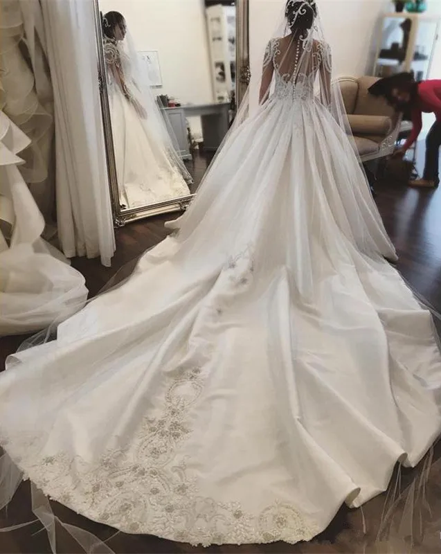 Illusion Long Sleeves Wedding Dresses Lace Applique Sheer Neck Vestidos De Novia Buttons Back Ruched Satin A Line Bride Dress
Illusion Long Sleeves Wedding Dresses Lace Applique Sheer Neck Vestidos De Novia Buttons Back Ruched Satin A Line Bride Dress
