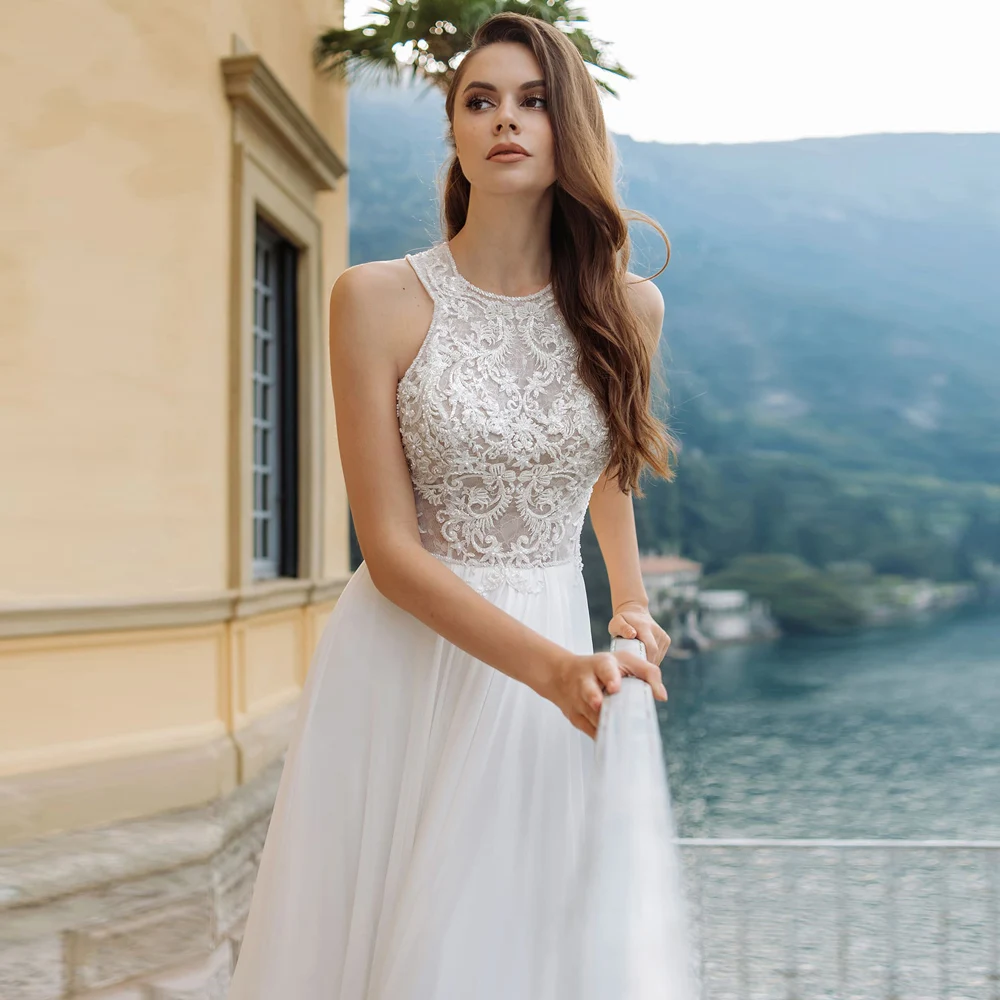 Sexy Halter Sleeveless Wedding Dress Boho Custom Made Lace Applique Chiffon A Line Beach Bridal Gown Plus Size 
Sexy Halter Sleeveless Wedding Dress Boho Custom Made Lace Applique Chiffon A Line Beach Bridal Gown Plus Size