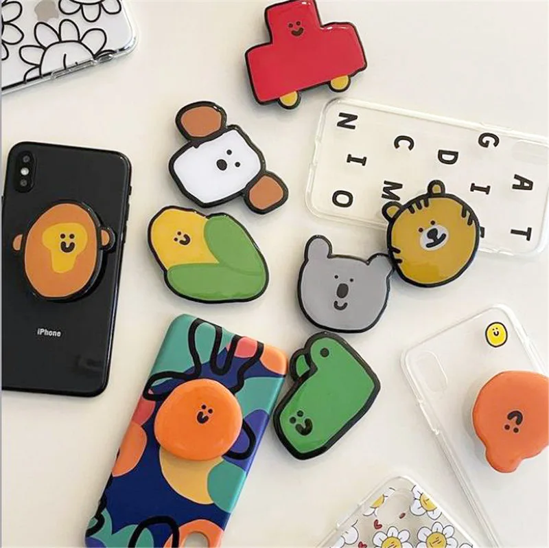 New Cartoon Round Finger Grip Mobile Phone Holder Expanding Stand Grip Pocket Socket Support Foldable Universal for Smartphone
New Cartoon Round Finger Grip Mobile Phone Holder Expanding Stand Grip Pocket Socket Support Foldable Universal for Smartphone