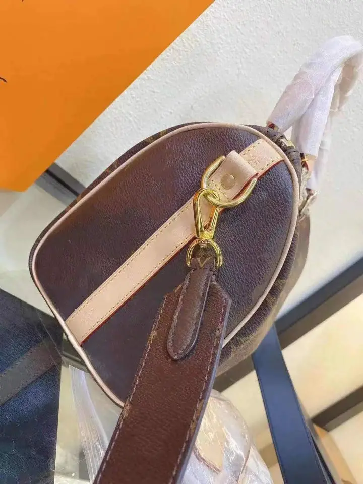 2021new pattern Handbags Genuine Speedy Bags Leather Quality Shoulder Bag Round Wide shoulder strap Bag Free shipping
2021new pattern Handbags Genuine Speedy Bags Leather Quality Shoulder Bag Round Wide shoulder strap Bag Free shipping