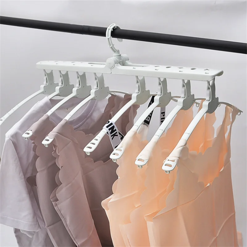 Многофункциональная телескопическая Вешалка, волшебная Складная сушилка для одежды, многослойная пластиковая вешалка для гардероба 
Многофункциональная телескопическая Вешалка, волшебная Складная сушилка для одежды, многослойная пластиковая вешалка для гардероба