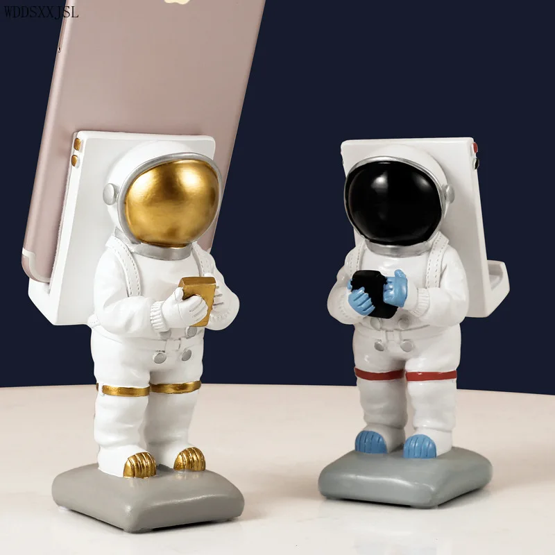 WDDSXXJSL Creative Astronaut Mobile Phone Stand Decoration Resin Crafts Home Living Room Cute Mobile Phone Stand Resin ornaments
WDDSXXJSL Creative Astronaut Mobile Phone Stand Decoration Resin Crafts Home Living Room Cute Mobile Phone Stand Resin ornaments