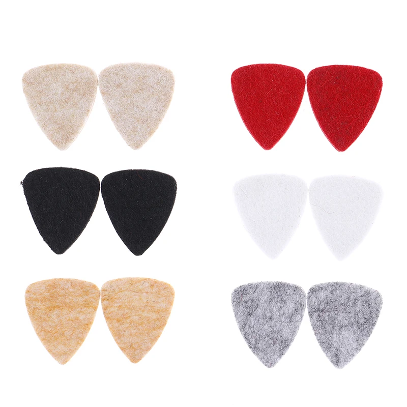 2Pcs Ukulele soft felt picks plectrum personalized ukelele accessories 31mm * 26mm
2Pcs Ukulele soft felt picks plectrum personalized ukelele accessories 31mm * 26mm