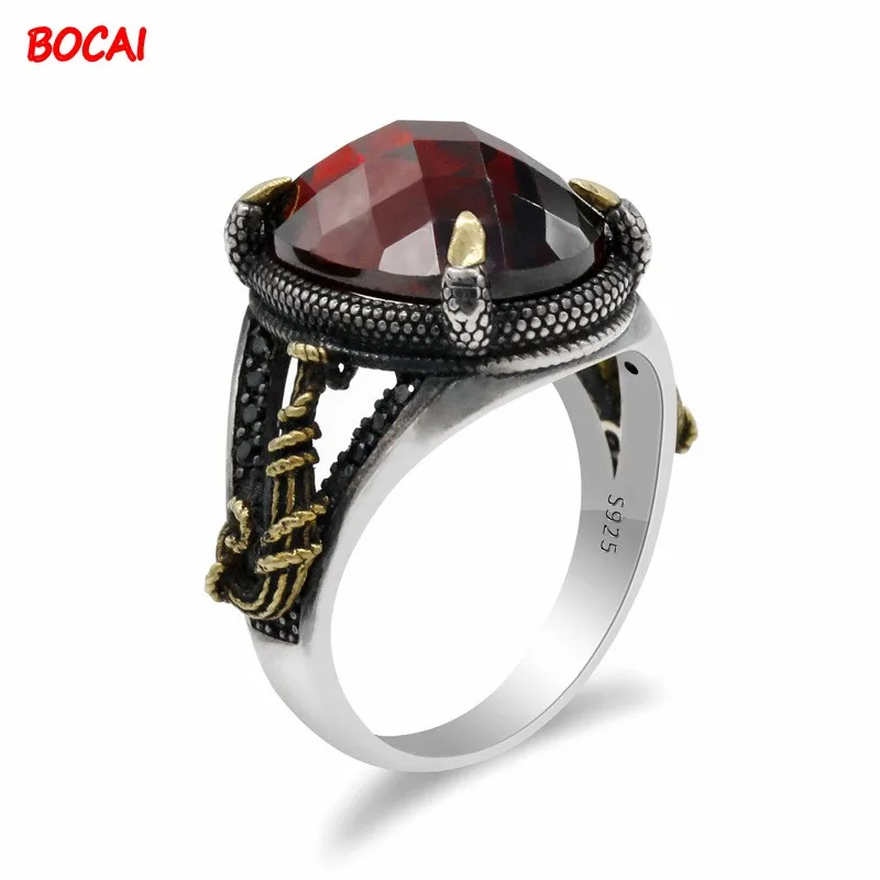 

New European and American two-tone men's ring 925 silver claw inlaid red gemstone ring
