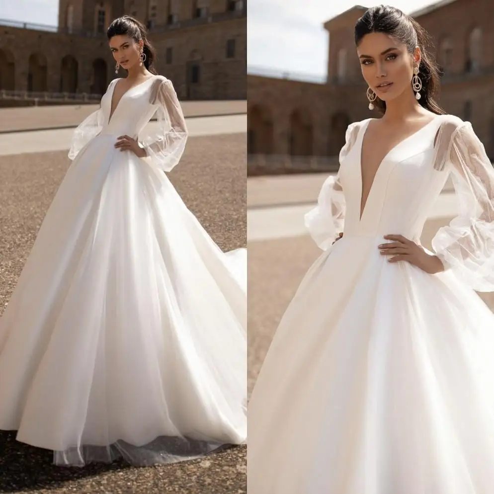 New Beach Bohemian A-Line Wedding Dresses Deep V Neck Long Illusion Sleeves Bridal Gown Plus Size Court Train Boho Wedding Dress
New Beach Bohemian A-Line Wedding Dresses Deep V Neck Long Illusion Sleeves Bridal Gown Plus Size Court Train Boho Wedding Dress