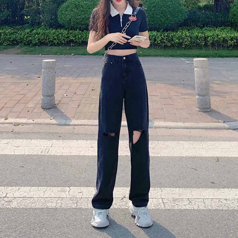 Black high waisted beggar's jeans with holes for women's new straight pants in spring 2021
Black high waisted beggar's jeans with holes for women's new straight pants in spring 2021