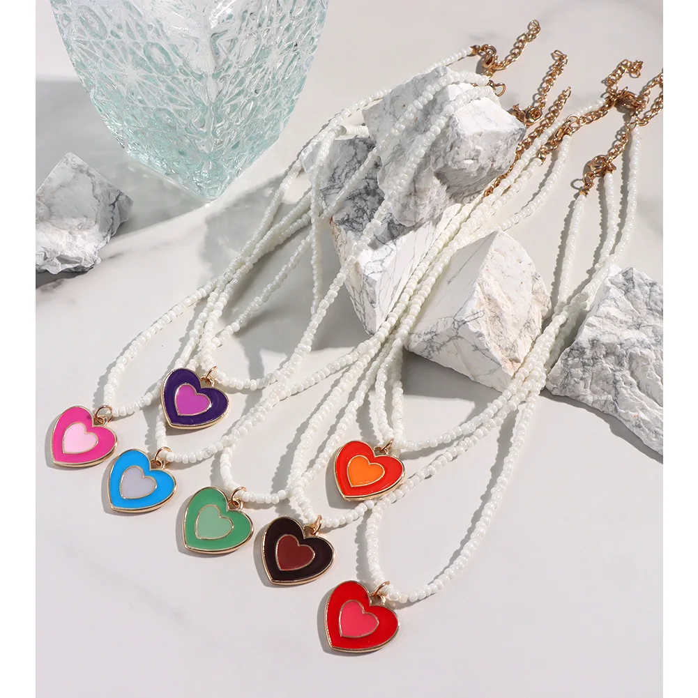 Fashion Colored Enamel Heart Beaded Necklace For Women Party Jewelry White Handmade Rice Bead Choker Double Layer Love Necklaces
Fashion Colored Enamel Heart Beaded Necklace For Women Party Jewelry White Handmade Rice Bead Choker Double Layer Love Necklaces