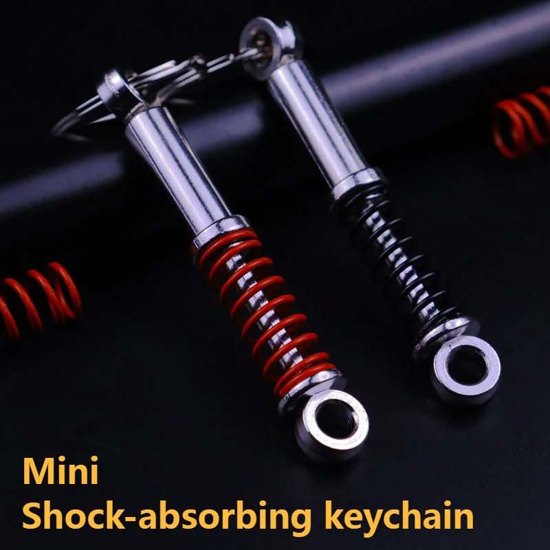 Car mini shock absorber keychain, auto parts, adjustment parts, shock absorber, key chain, spring
Car mini shock absorber keychain, auto parts, adjustment parts, shock absorber, key chain, spring