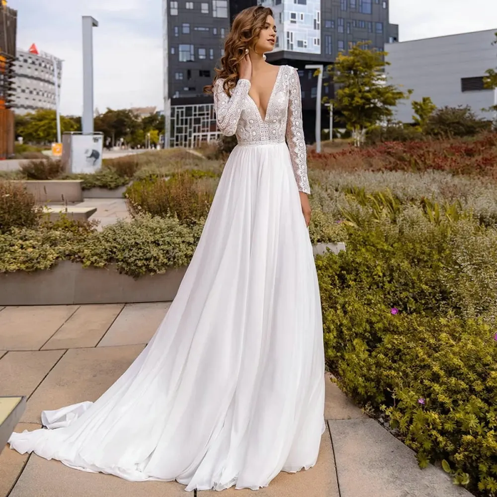 2021 New Fanweimei Chiffon A Line Bridal Dress Sexy V-neck Applique Lace Long Sleeve Backless Wedding Gowns with Sweep Train
2021 New Fanweimei Chiffon A Line Bridal Dress Sexy V-neck Applique Lace Long Sleeve Backless Wedding Gowns with Sweep Train
