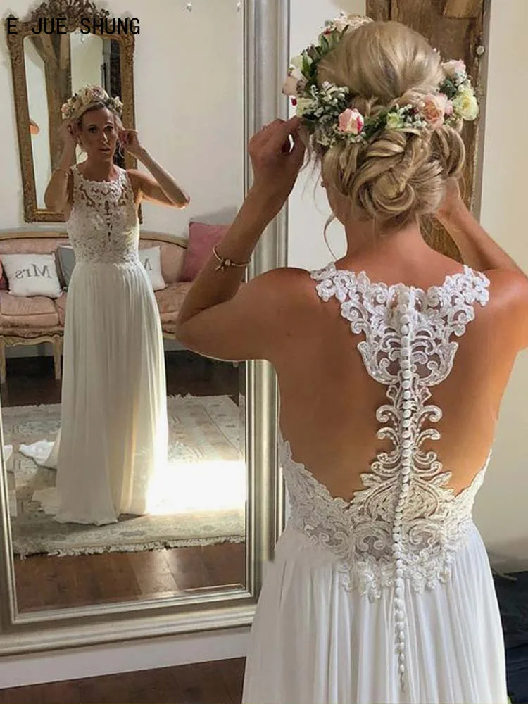 E JUE SHUNG White Simple Sleeveless Wedding Dresses O-Neck A Line Button Back Boho Wedding Gowns Lace Appliques vestido de noiva
E JUE SHUNG White Simple Sleeveless Wedding Dresses O-Neck A Line Button Back Boho Wedding Gowns Lace Appliques vestido de noiva