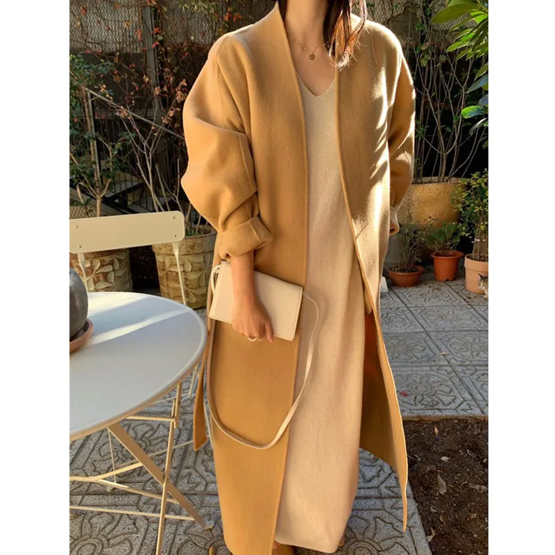 Длинное шерстяное пальто во французском стиле, однотонное длинное пальто в стиле ретро, шикарное длинное пальто с поясом, 2021 
Длинное шерстяное пальто во французском стиле, однотонное длинное пальто в стиле ретро, шикарное длинное пальто с поясом, 2021