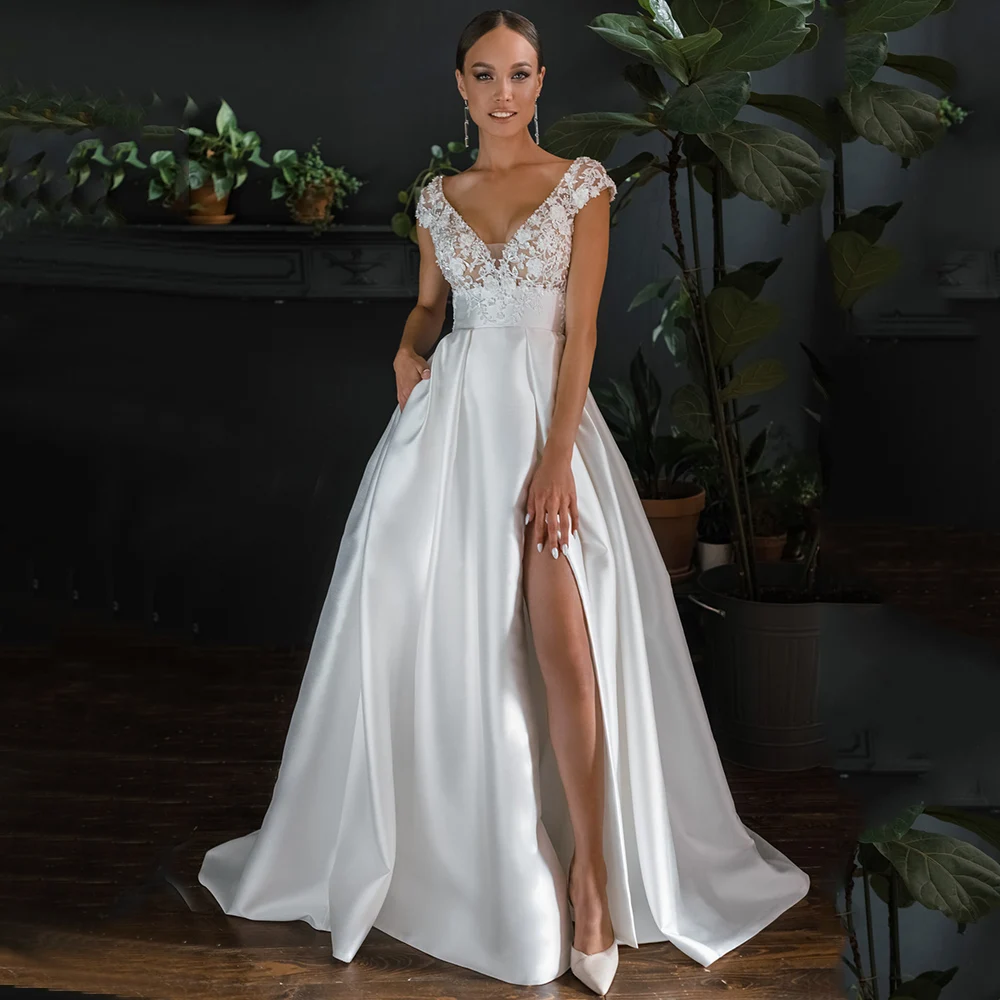 Satin Simple Wedding Dresses V-Neck Appliques Lace A-Line Backless High Side Splite Boho Bridal Gowns 2021 Vestidos De Novia
Satin Simple Wedding Dresses V-Neck Appliques Lace A-Line Backless High Side Splite Boho Bridal Gowns 2021 Vestidos De Novia