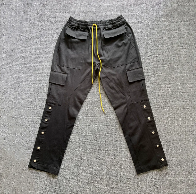 Best Quality RHUDE Fashion Pants Black Men 1:1 Multi Button Pockets Rhude Cargo Pants Yellow Drawstring Jogger Women Sweatpants
Best Quality RHUDE Fashion Pants Black Men 1:1 Multi Button Pockets Rhude Cargo Pants Yellow Drawstring Jogger Women Sweatpants