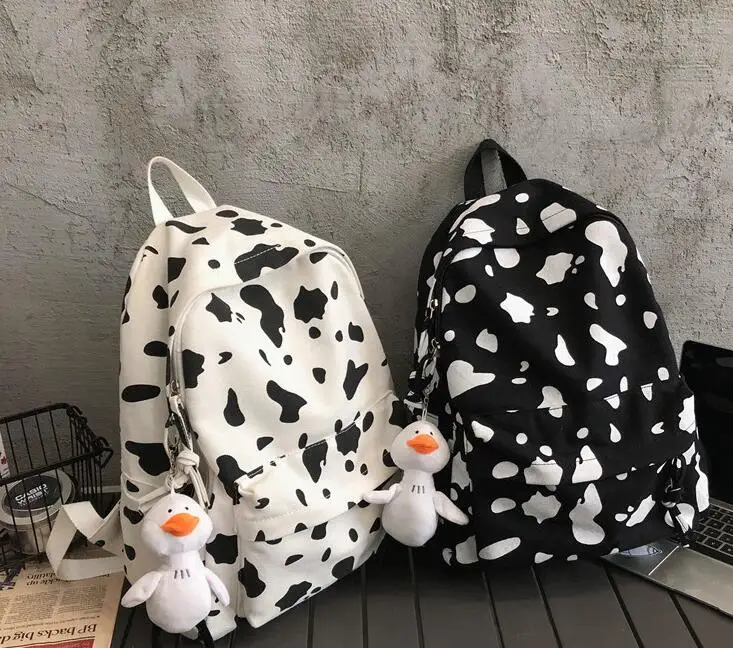 DHL10pcs Backpack Bag Women Nylon Cow Prints Large Capacity Sport School Bags White Black
DHL10pcs Backpack Bag Women Nylon Cow Prints Large Capacity Sport School Bags White Black