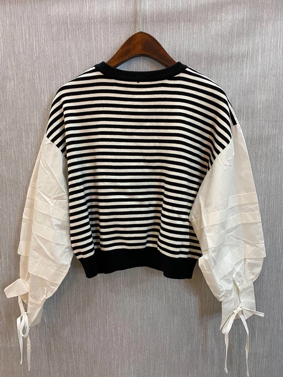 2020 autumn and winter new women's round neck color matching stitching striped sleeve decoration long-sleeved sweater 1
2020 autumn and winter new women's round neck color matching stitching striped sleeve decoration long-sleeved sweater 1