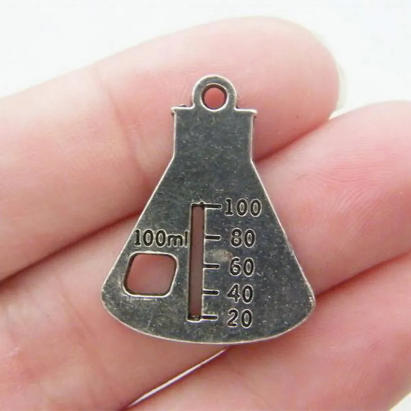 4pcs 26x21mm Science Beaker Charms Antique Silver Color Tone Metal Alloy Keychain Pendant Accessories DIY Handmade Jewelry Craft
4pcs 26x21mm Science Beaker Charms Antique Silver Color Tone Metal Alloy Keychain Pendant Accessories DIY Handmade Jewelry Craft