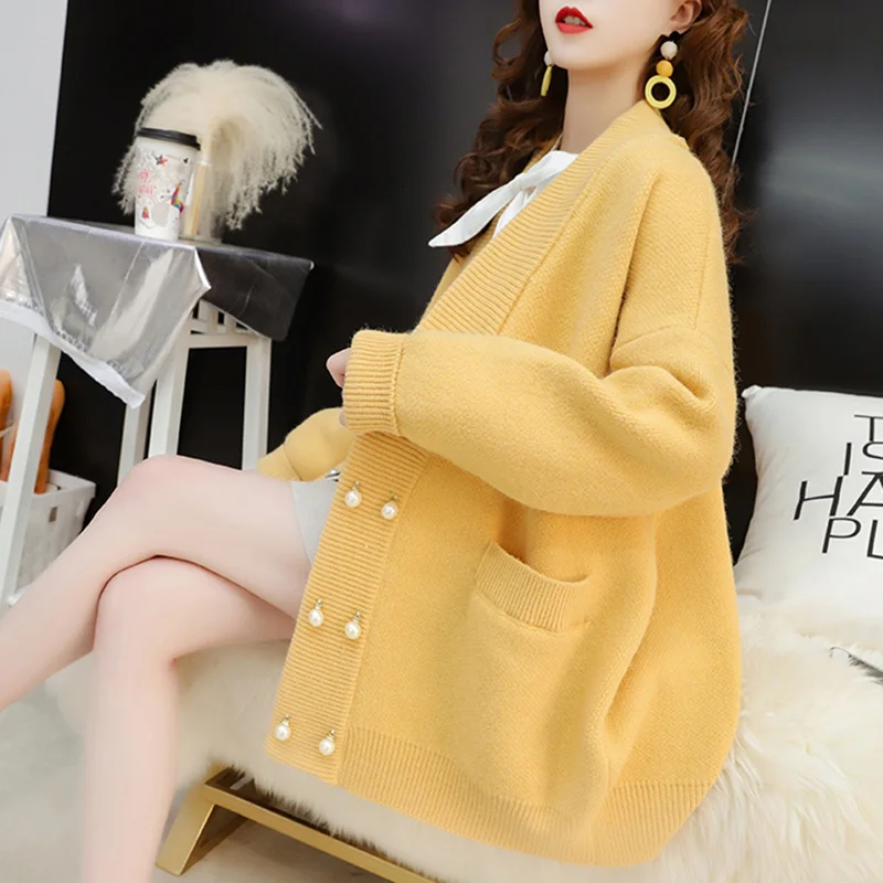 Femmes Pearl Button Loose Knit Cardigan Women With Pocket Autumn Winter Sweater Jacket V-Neck Long Sleeve Female Outwear
Femmes Pearl Button Loose Knit Cardigan Women With Pocket Autumn Winter Sweater Jacket V-Neck Long Sleeve Female Outwear
