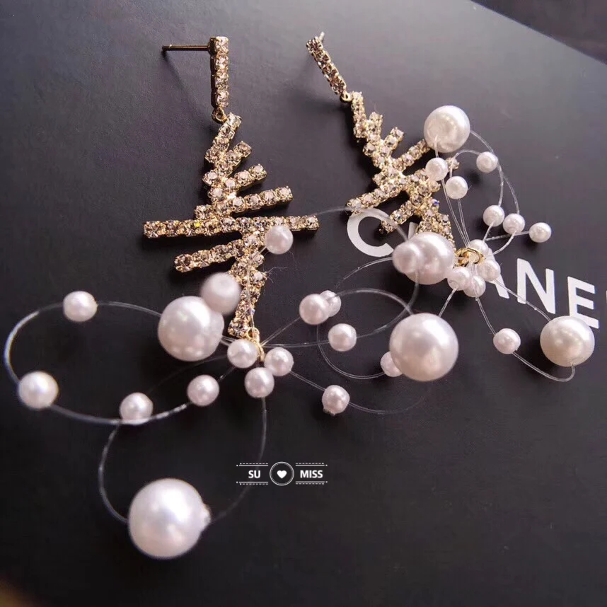 Free Shipping Korea Handmade Exaggerated Pearl Beads with Fishing Line Drop Earrings New Fashion Geometric Long Earrings
Free Shipping Korea Handmade Exaggerated Pearl Beads with Fishing Line Drop Earrings New Fashion Geometric Long Earrings