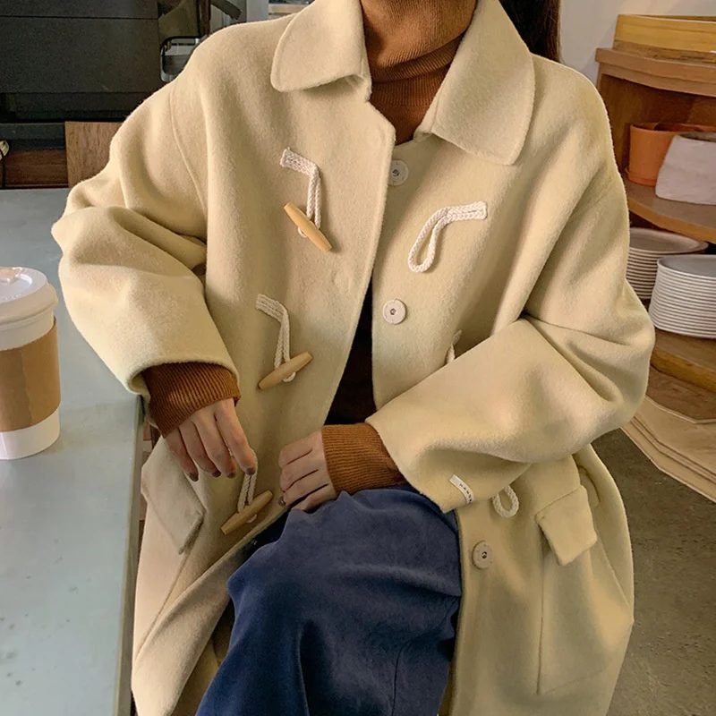Korean Chic Autumn and Winter Gentle Temperament Lapel Ox Horn Buckle Loose Double Pocket Long Sleeve Medium and Long Wool Coat
Korean Chic Autumn and Winter Gentle Temperament Lapel Ox Horn Buckle Loose Double Pocket Long Sleeve Medium and Long Wool Coat