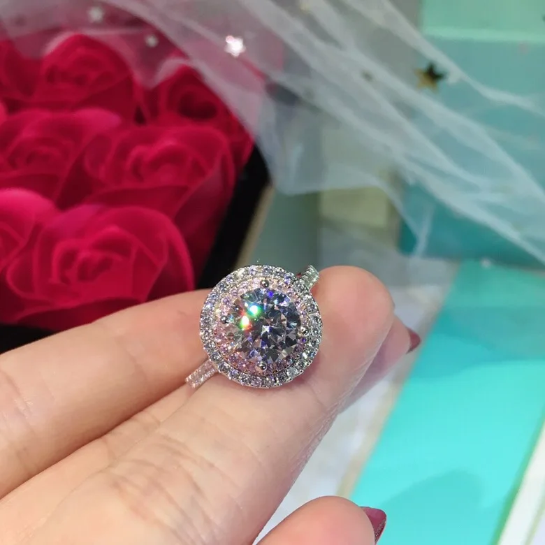 S925 Sterling silver pink round ring 2 carats zirconia romantic wedding ring woman high-end Christmas jewelry gift
S925 Sterling silver pink round ring 2 carats zirconia romantic wedding ring woman high-end Christmas jewelry gift
