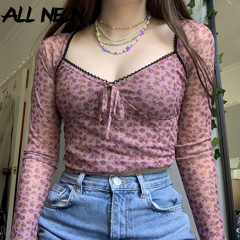 ALLNeon Vintage Y2K Streetwear Floral Print Mesh Crop Tops 2000s Fashion Sweet V-neck Bandage Long Sleeve T-shirts Transparent
ALLNeon Vintage Y2K Streetwear Floral Print Mesh Crop Tops 2000s Fashion Sweet V-neck Bandage Long Sleeve T-shirts Transparent